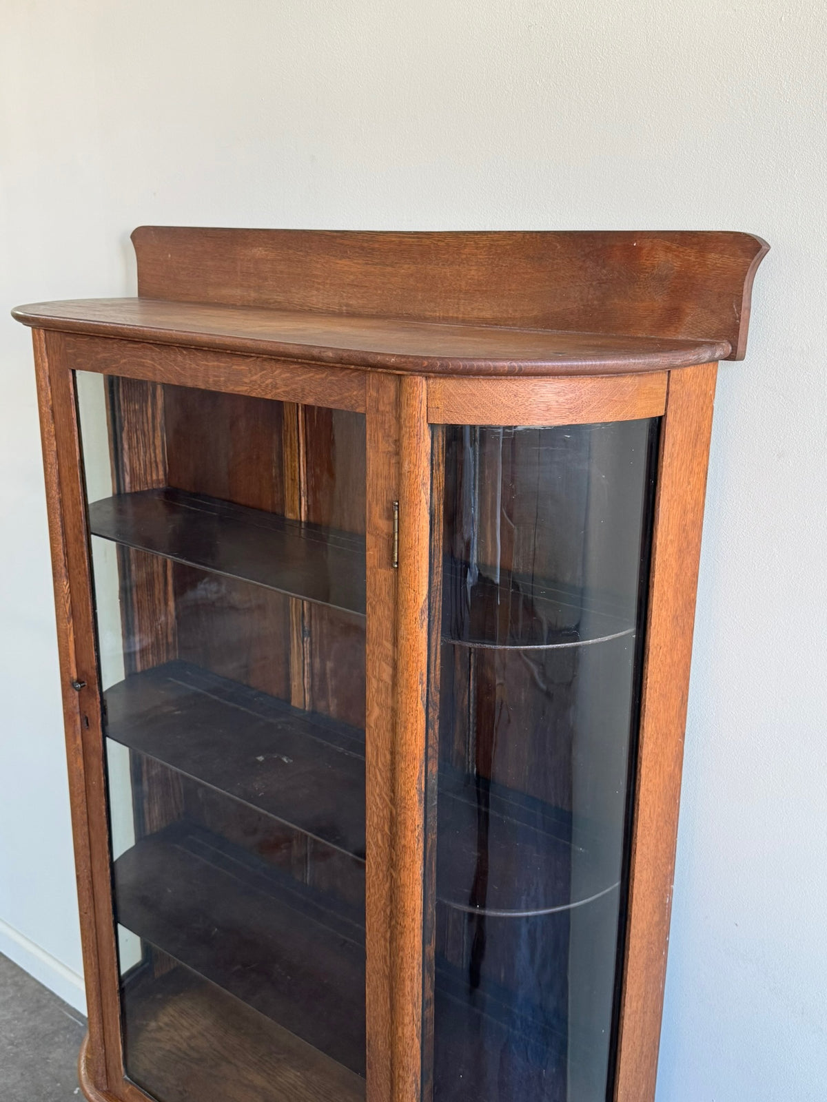 Golden oak display cabinet