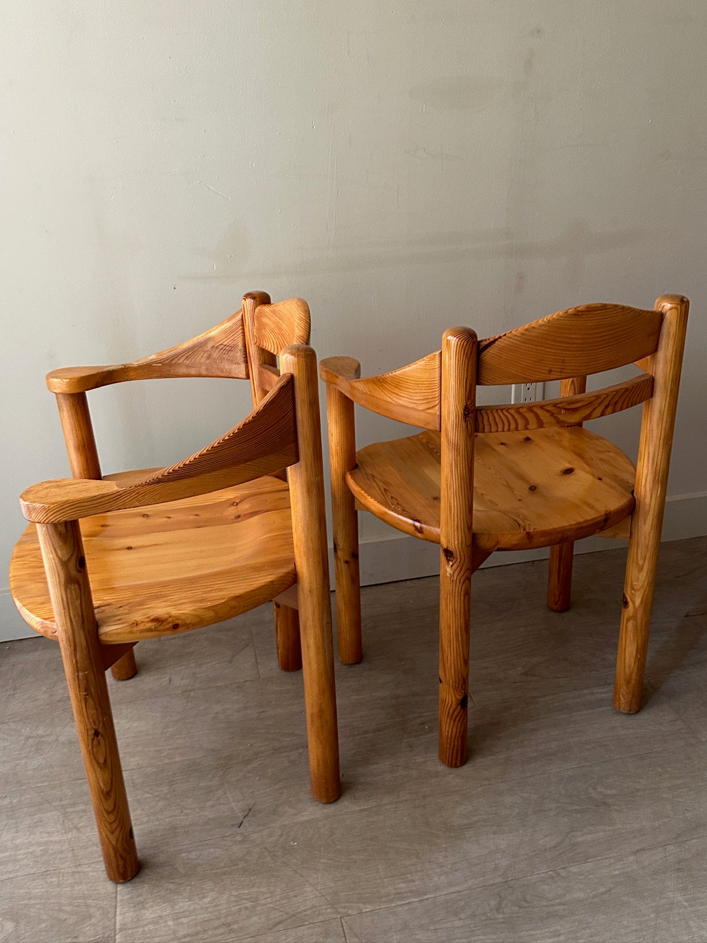 Rainer Daumiller pine dining chairs with arms. Sold as set of 2.