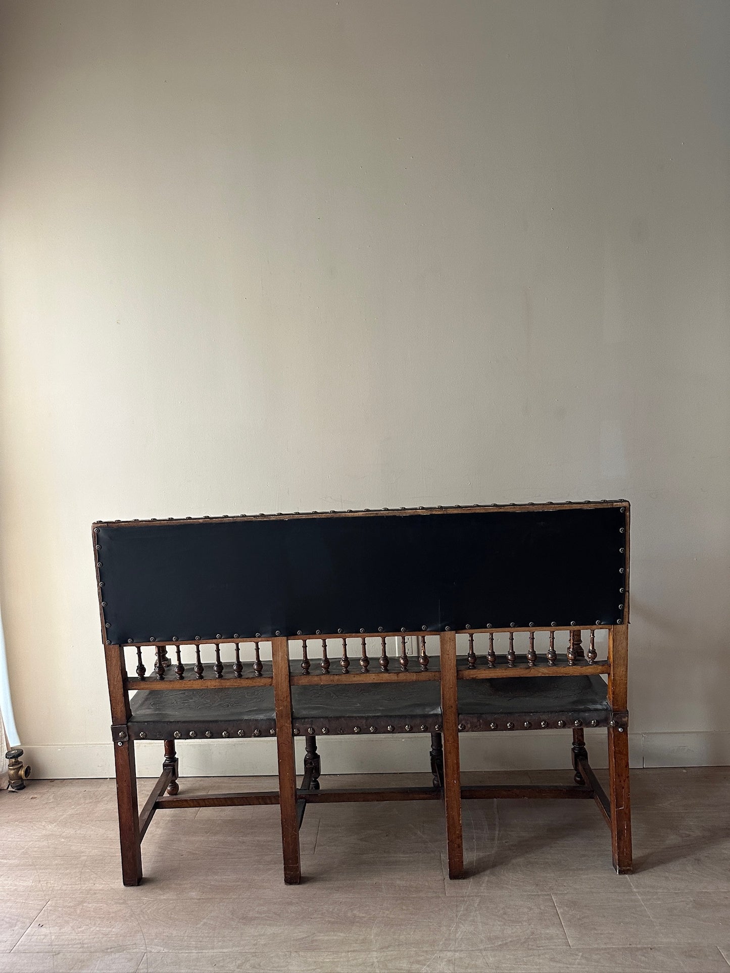 Embossed leather bench