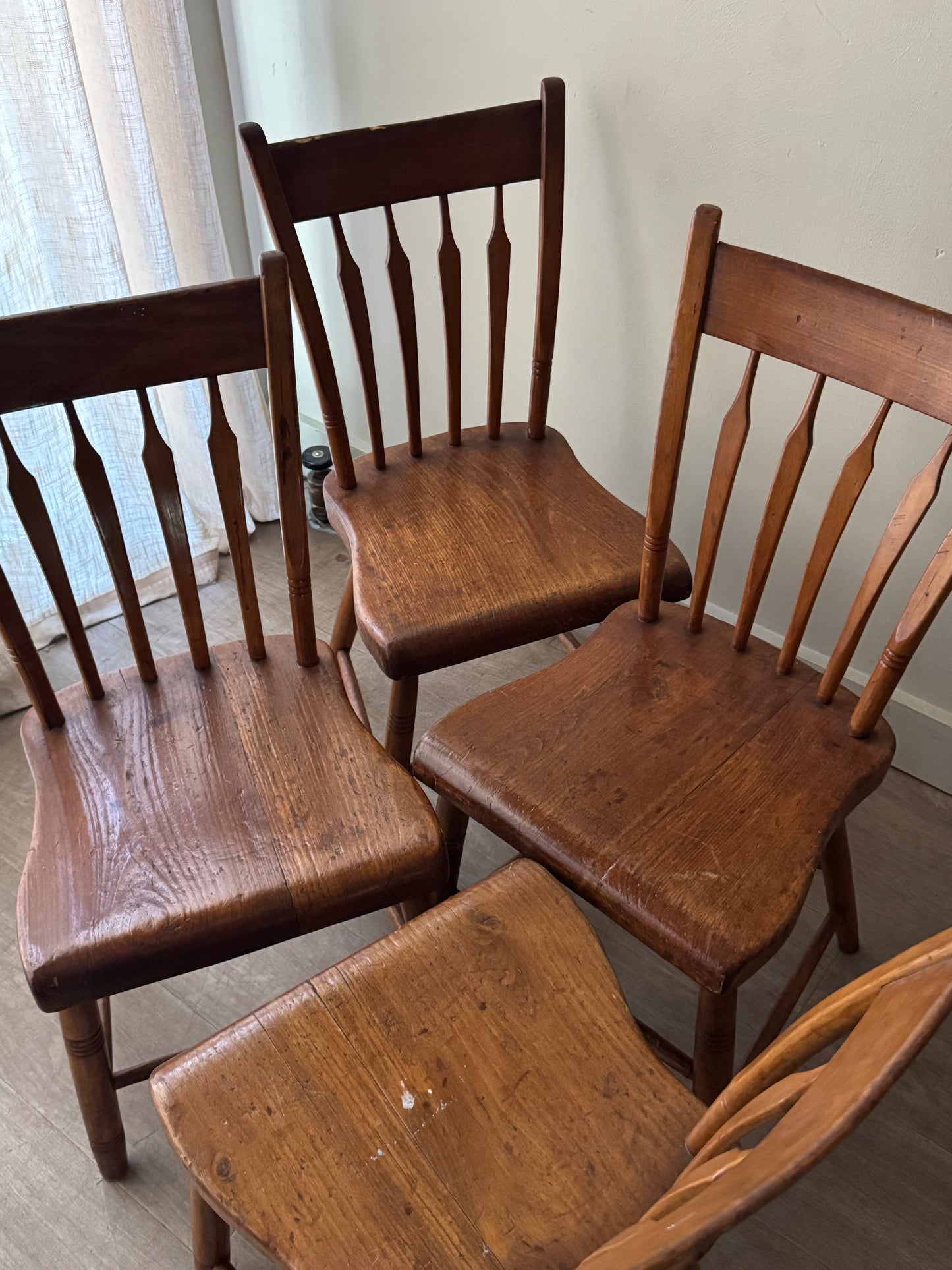 Pine plank seat dining chairs. Sold as a set of 4.