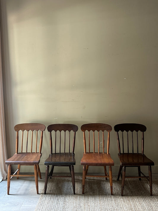 Scalloped mixed wood dining chairs. Sold in pairs.