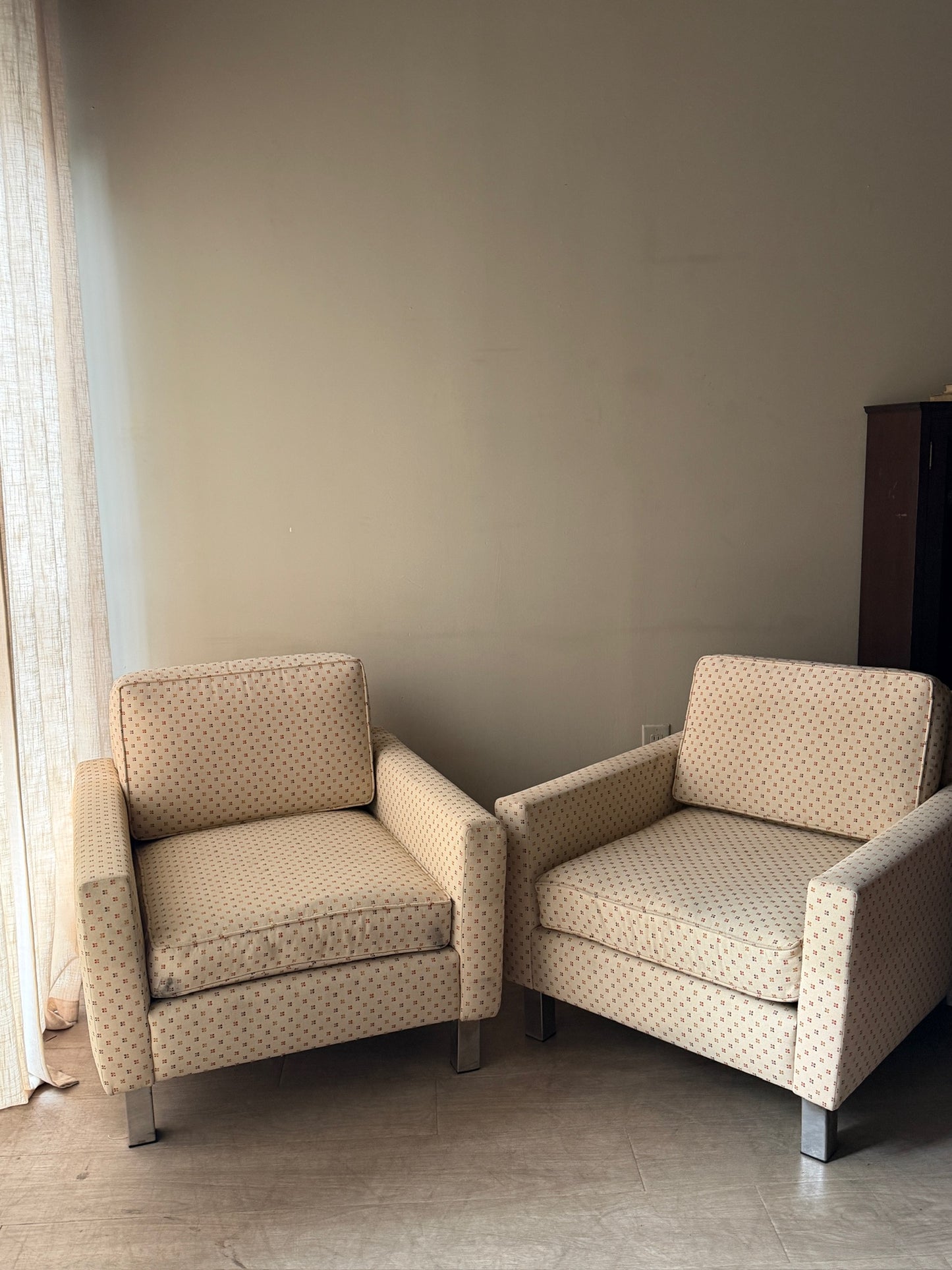 Upholstered chrome armchairs. Right.