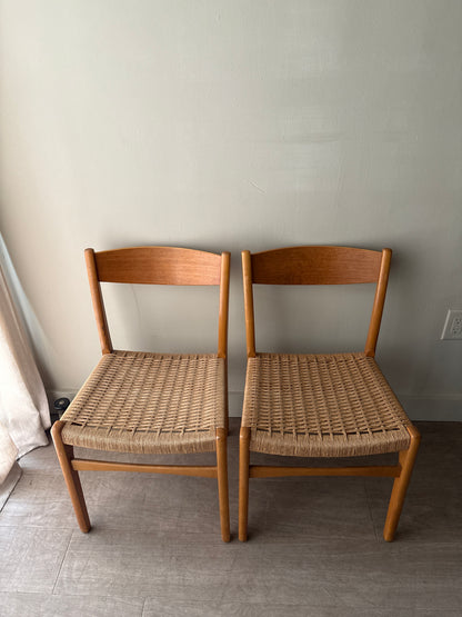 Swedish teak twisted rope seat dining chairs. Sold as a pair.
