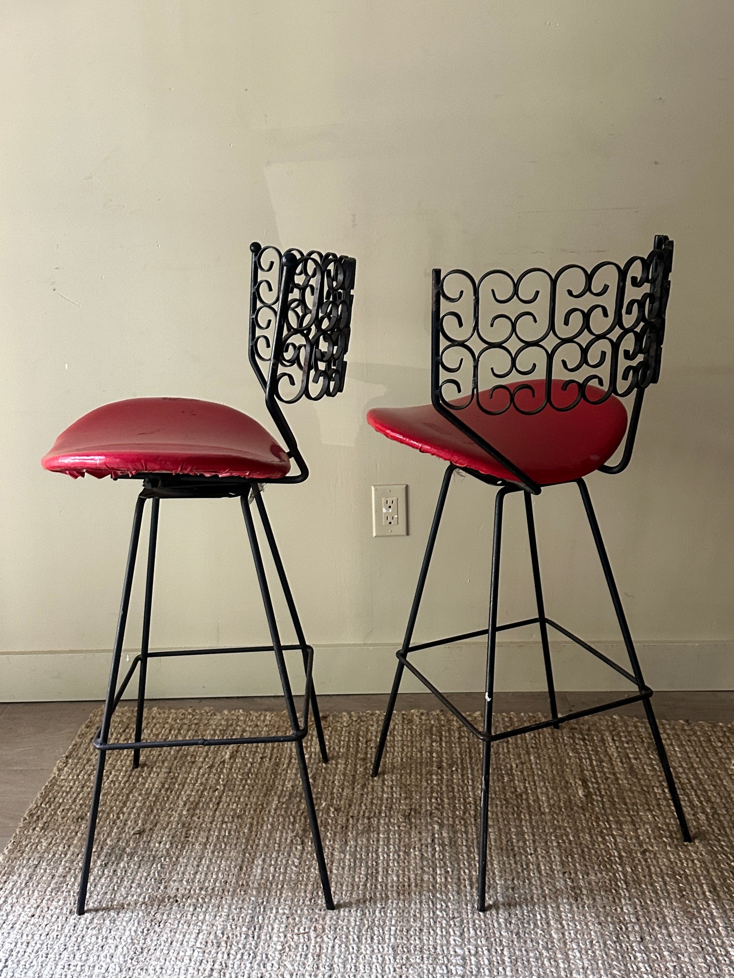 Umanoff bar stools. Sold as a pair.