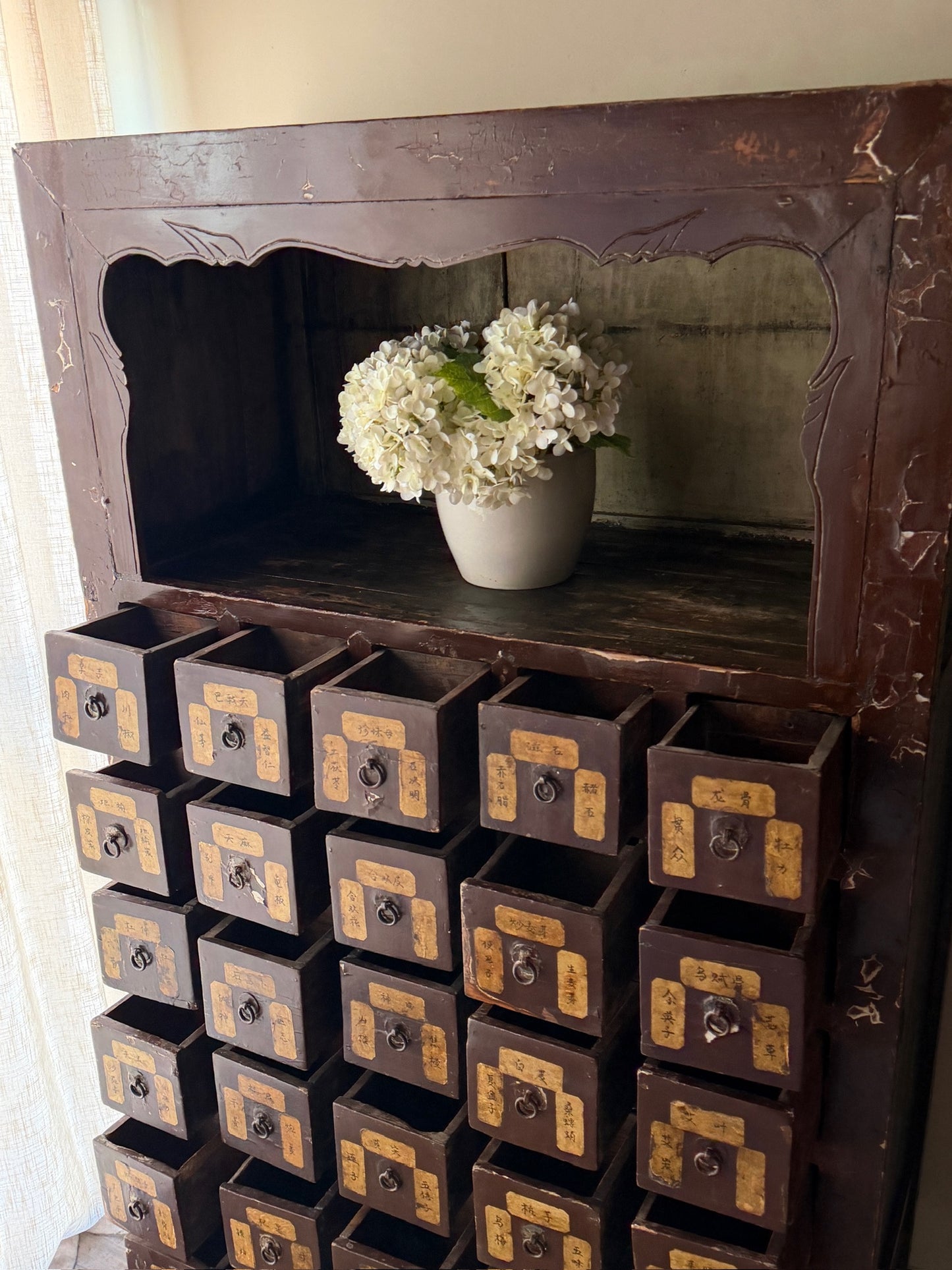 Chinese lacquered apothecary cabinet