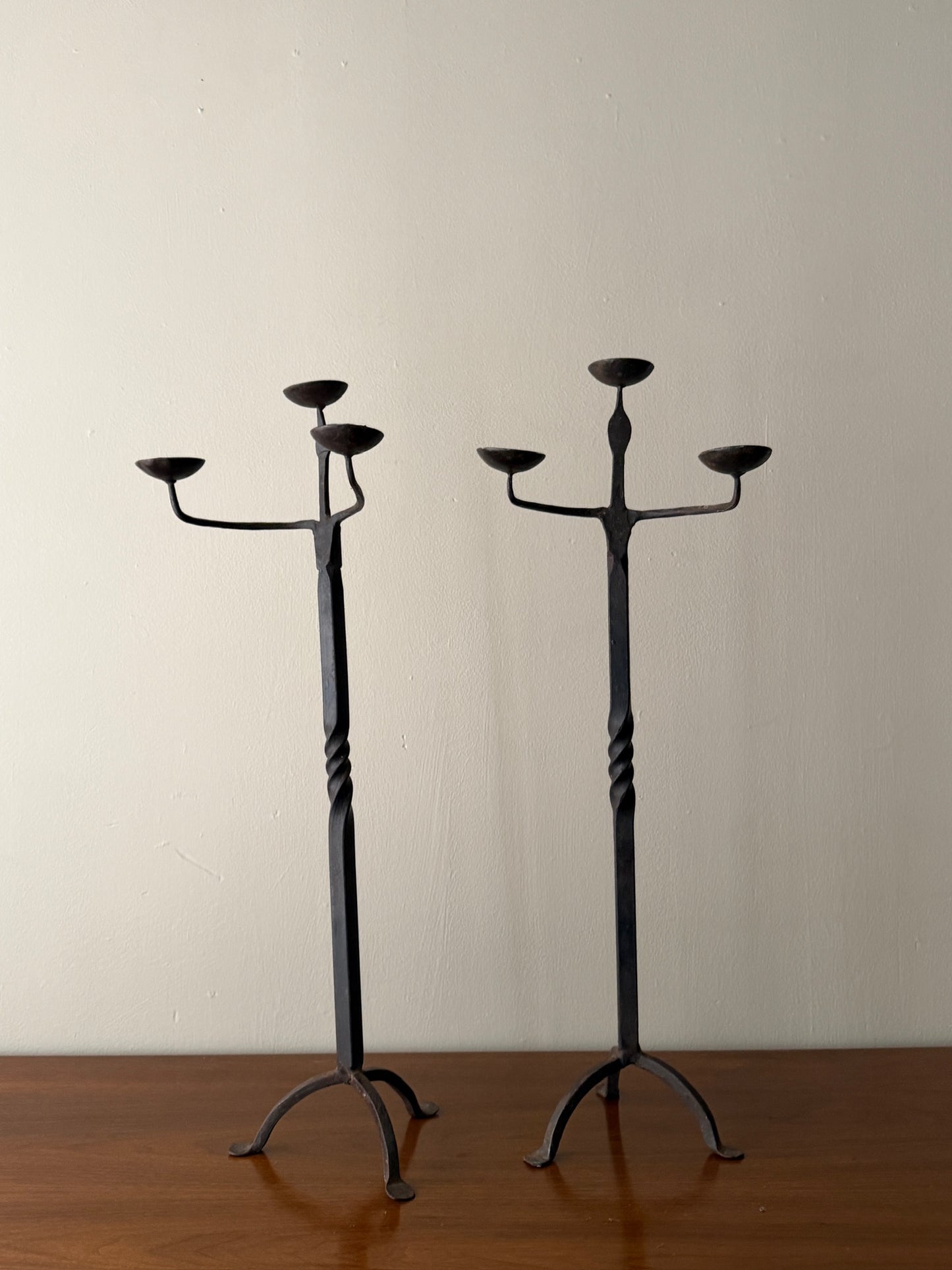 Pair of wrought iron candelabras
