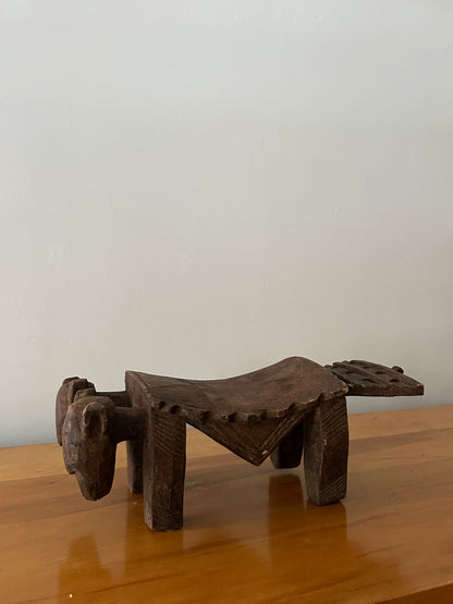 Hand carved headrest