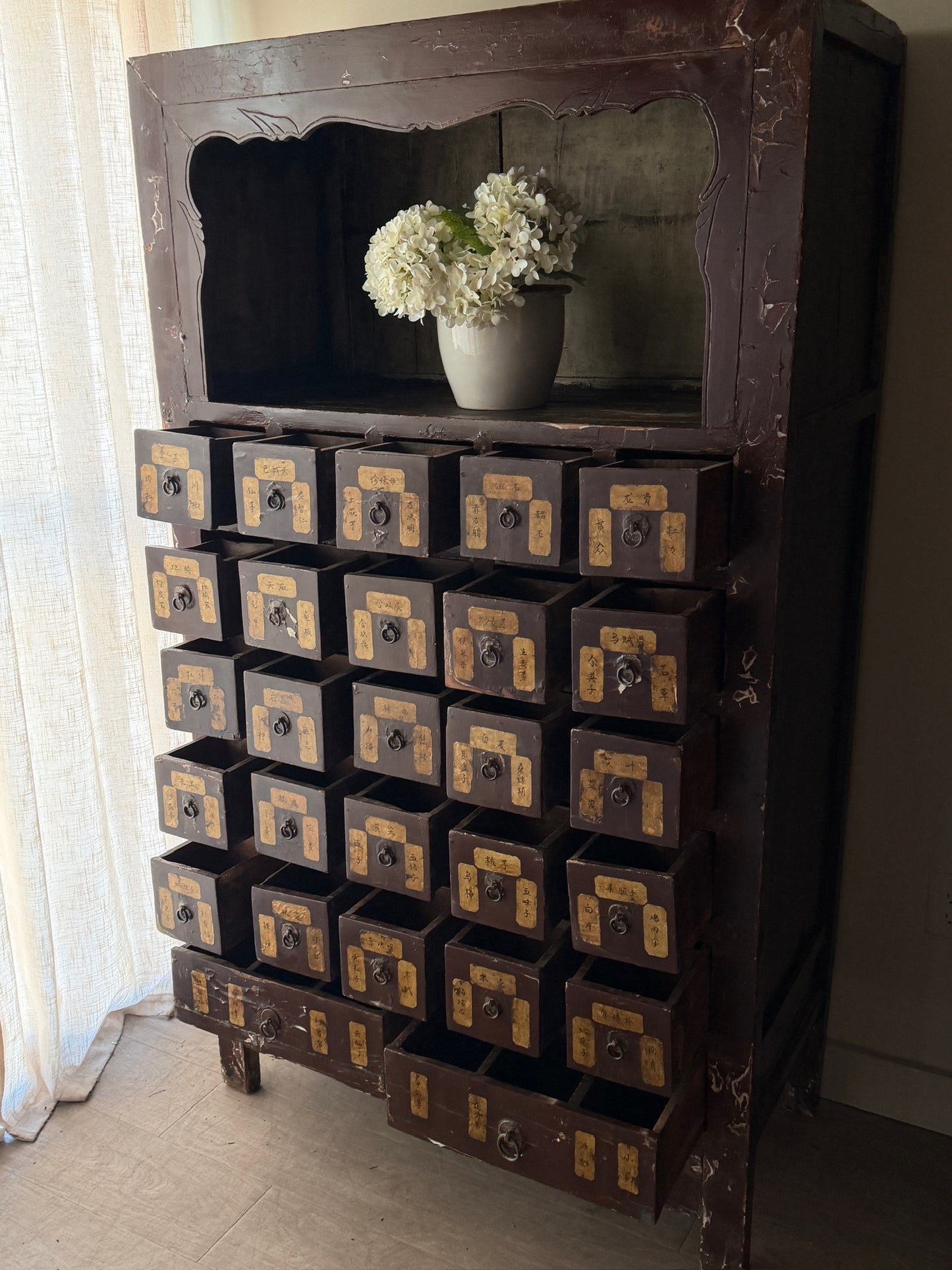 Chinese lacquered apothecary cabinet