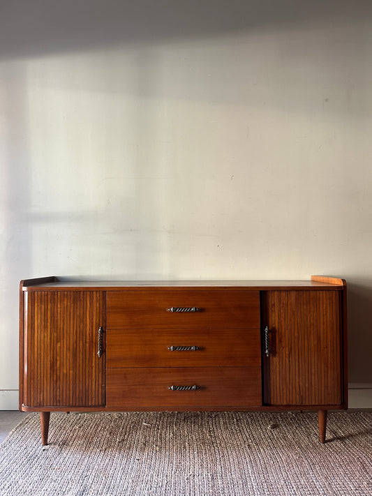 Accordion door credenza