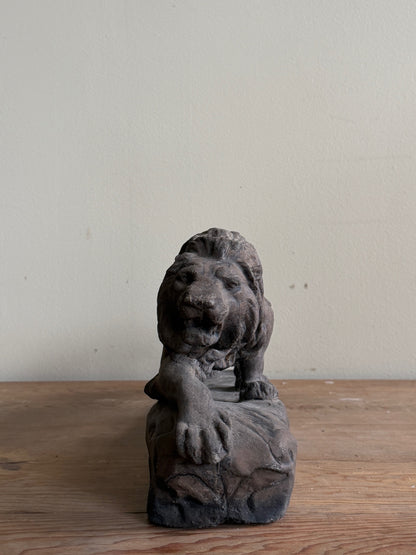 Cast-concrete lion sculpture