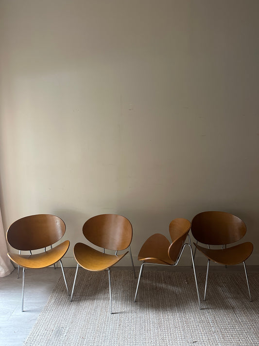 Beechwood clamshell chairs. Sold individually.
