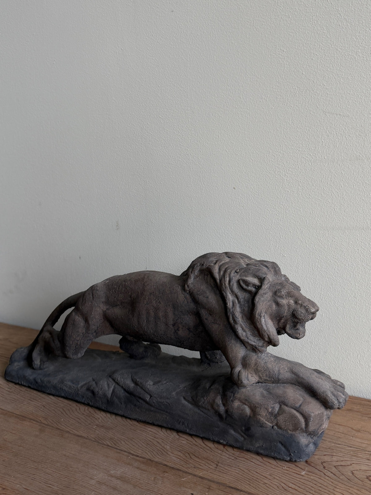 Cast-concrete lion sculpture