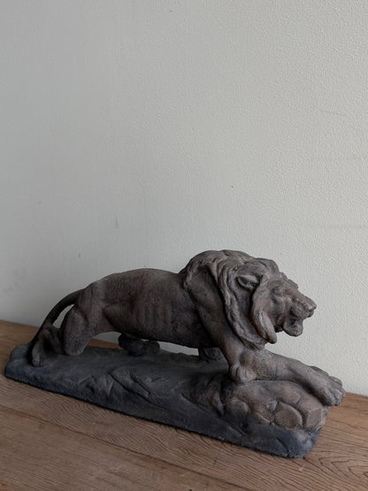 Cast-concrete lion sculpture