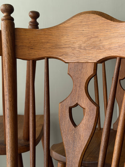 Scandinavian oak dining chairs. Sold as a set of 4.