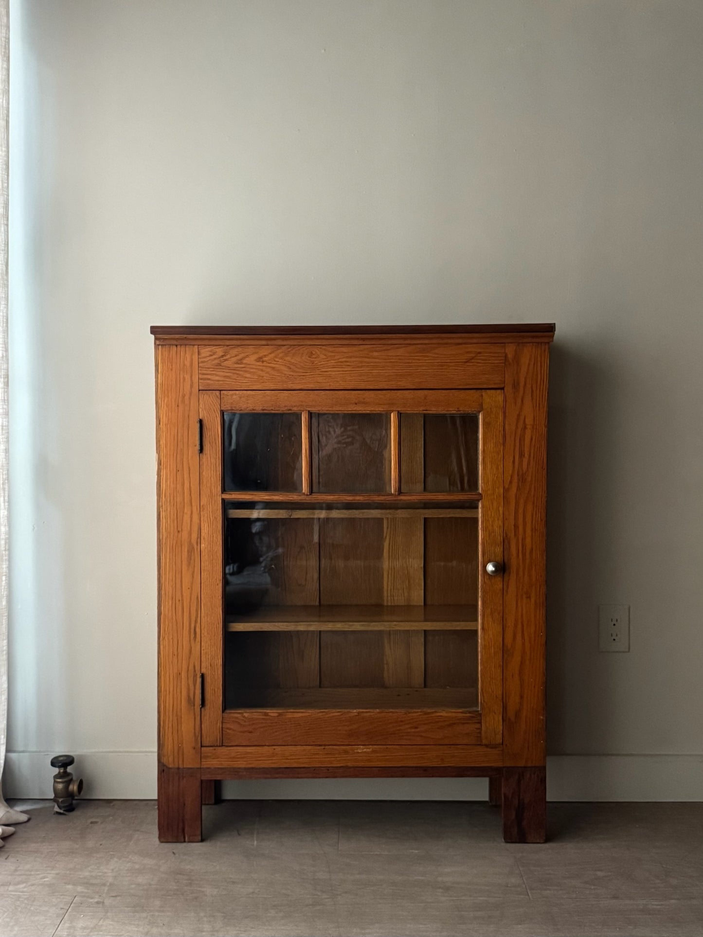 Golden oak display cabinet