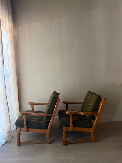 Henning Kjaernulf Danish oak lounge chairs. Sold individually.