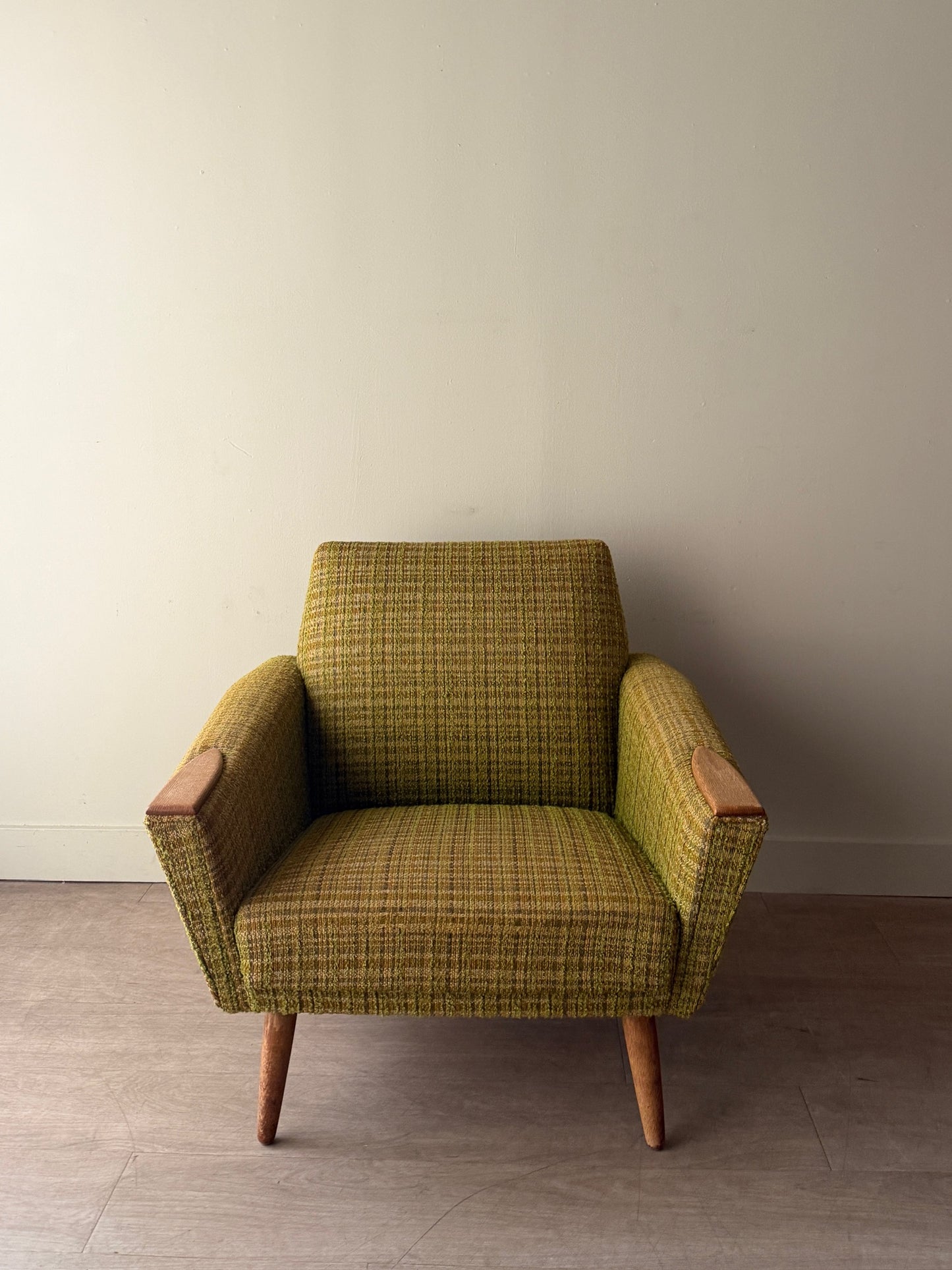 Green plaid Danish lounge chair