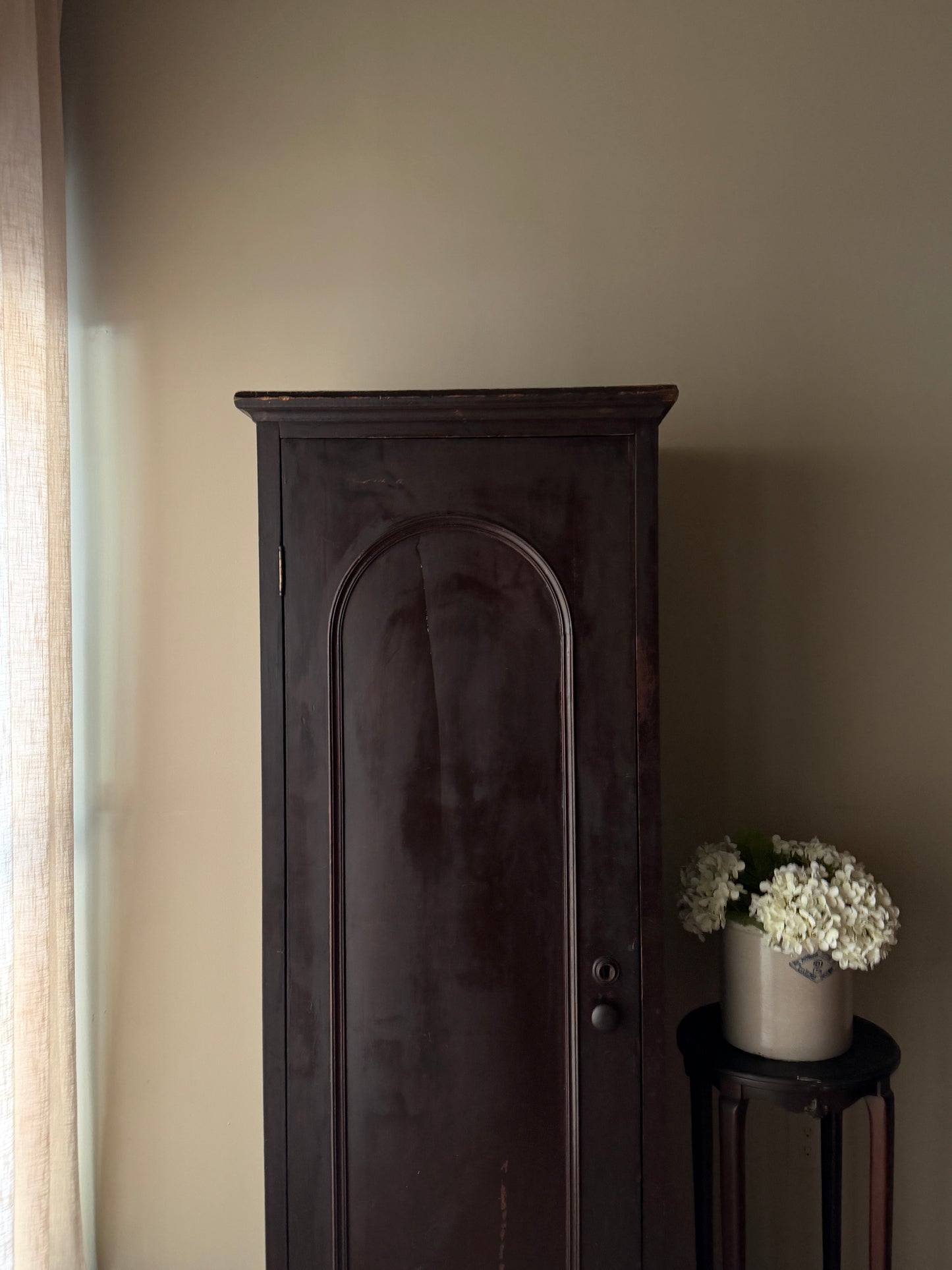 Dark stained chimney cupboard