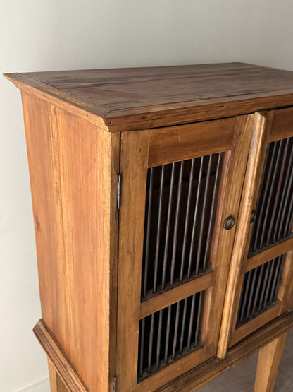Walnut spindle door cabinet