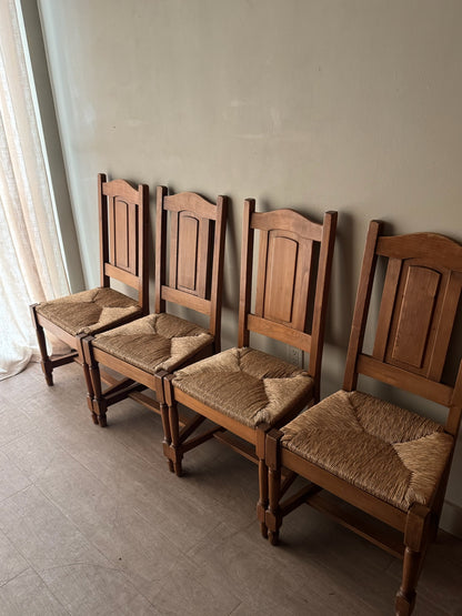 Dutch oak rush seat dining chairs. Sold in pairs.