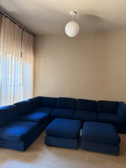 Sapphire blue modular sofa with ottomans
