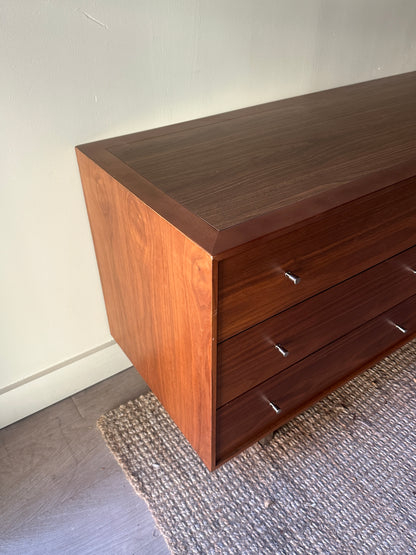Walnut credenza with chrome knobs