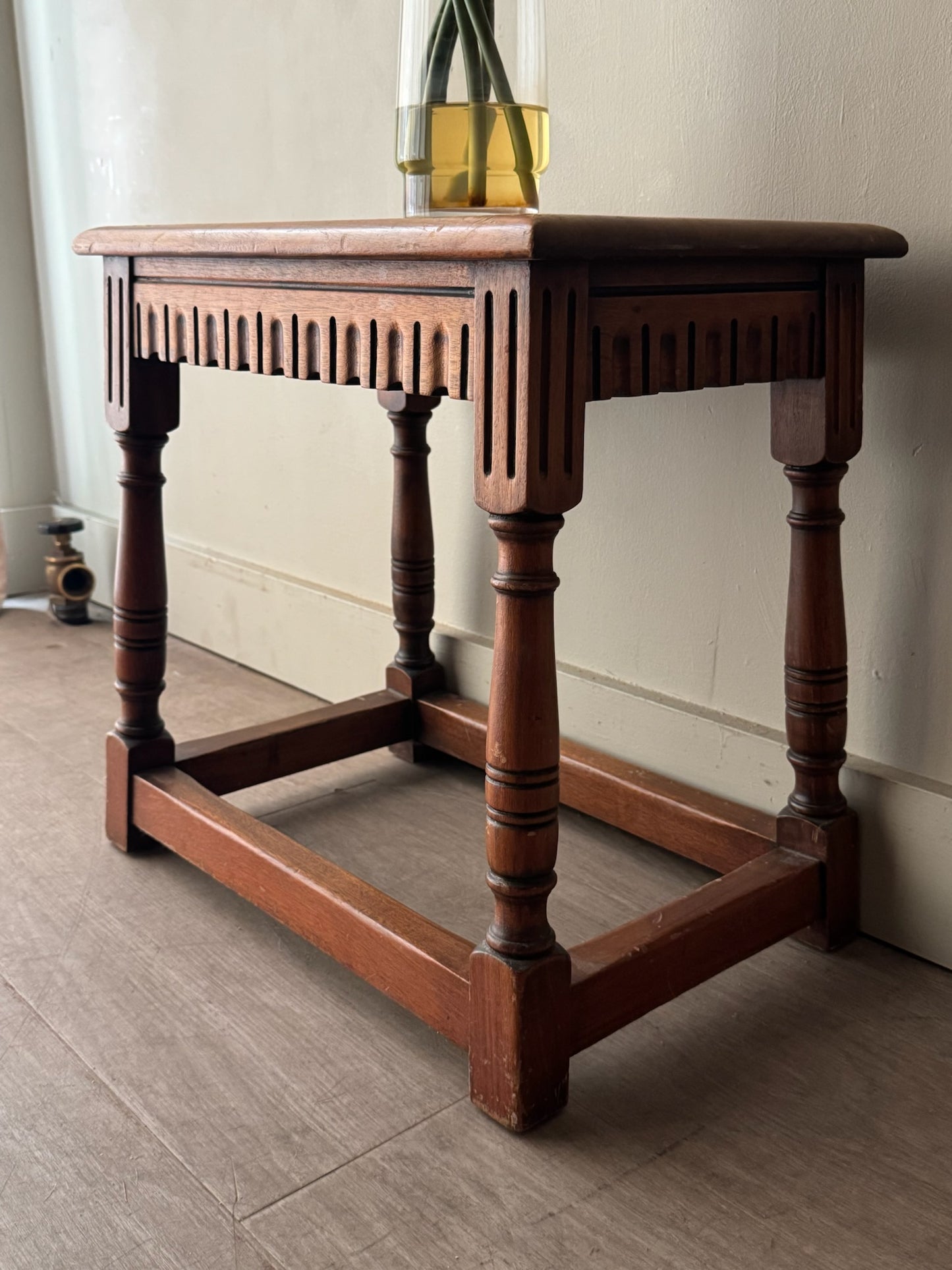 Walnut carved stool/side table
