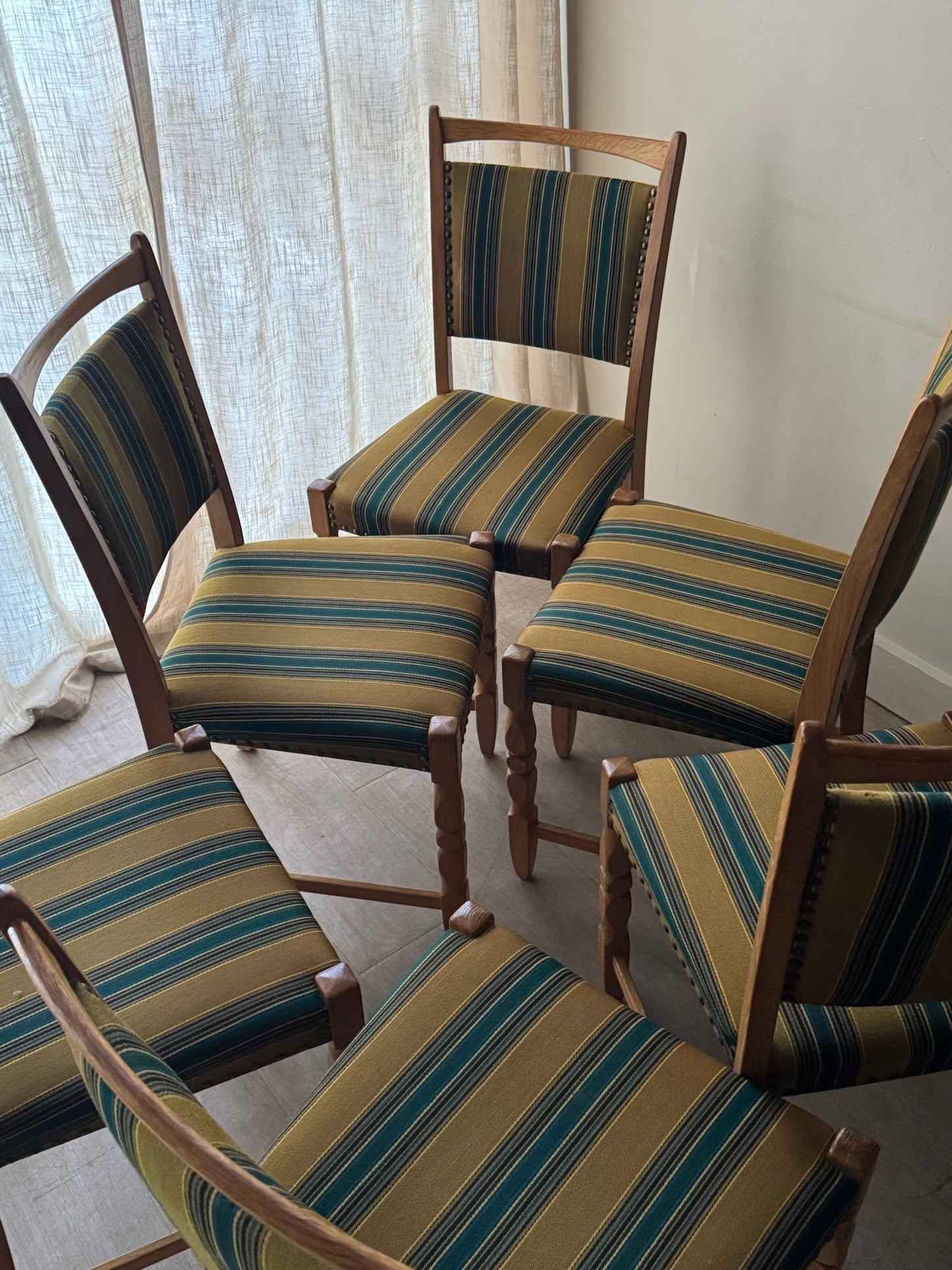 Danish oak dining chairs with striped upholstery. Sold in pairs.