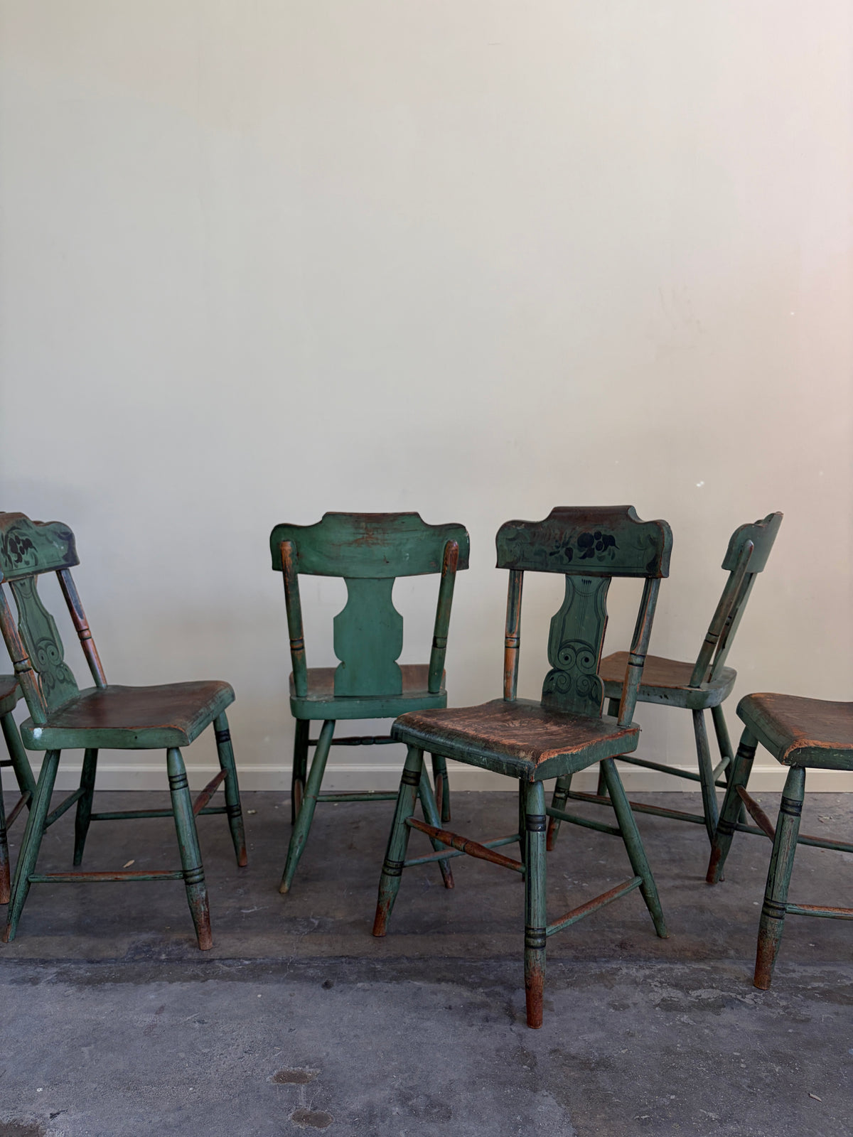 Pennsylvania Sheraton Paint-Decorated Plank Seat Chairs. Sold in pairs.