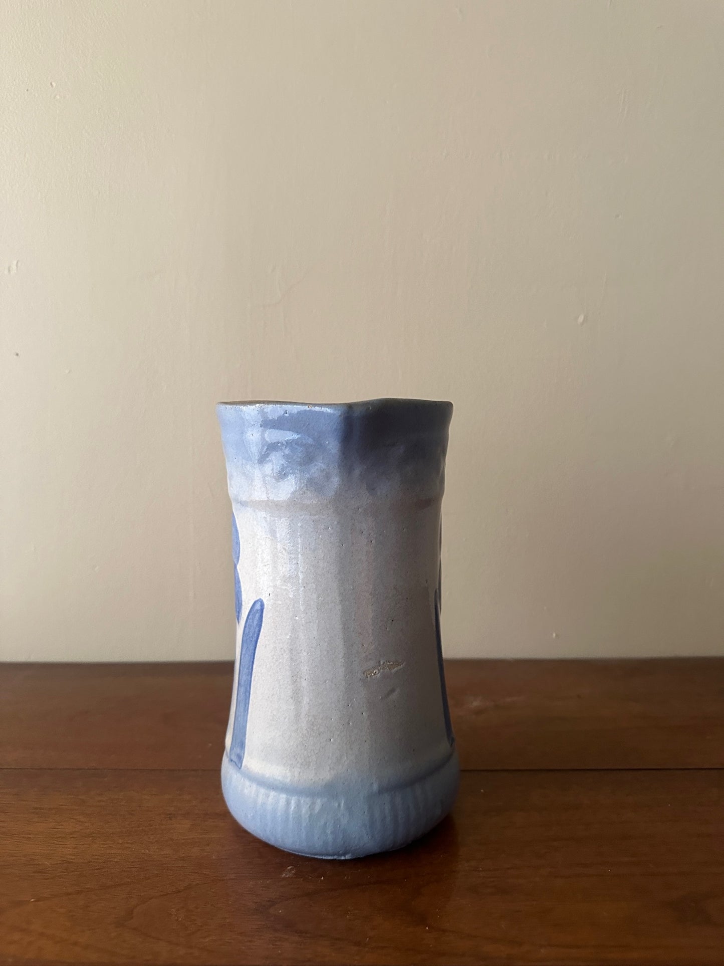 Salt glazed stoneware pitcher with flower