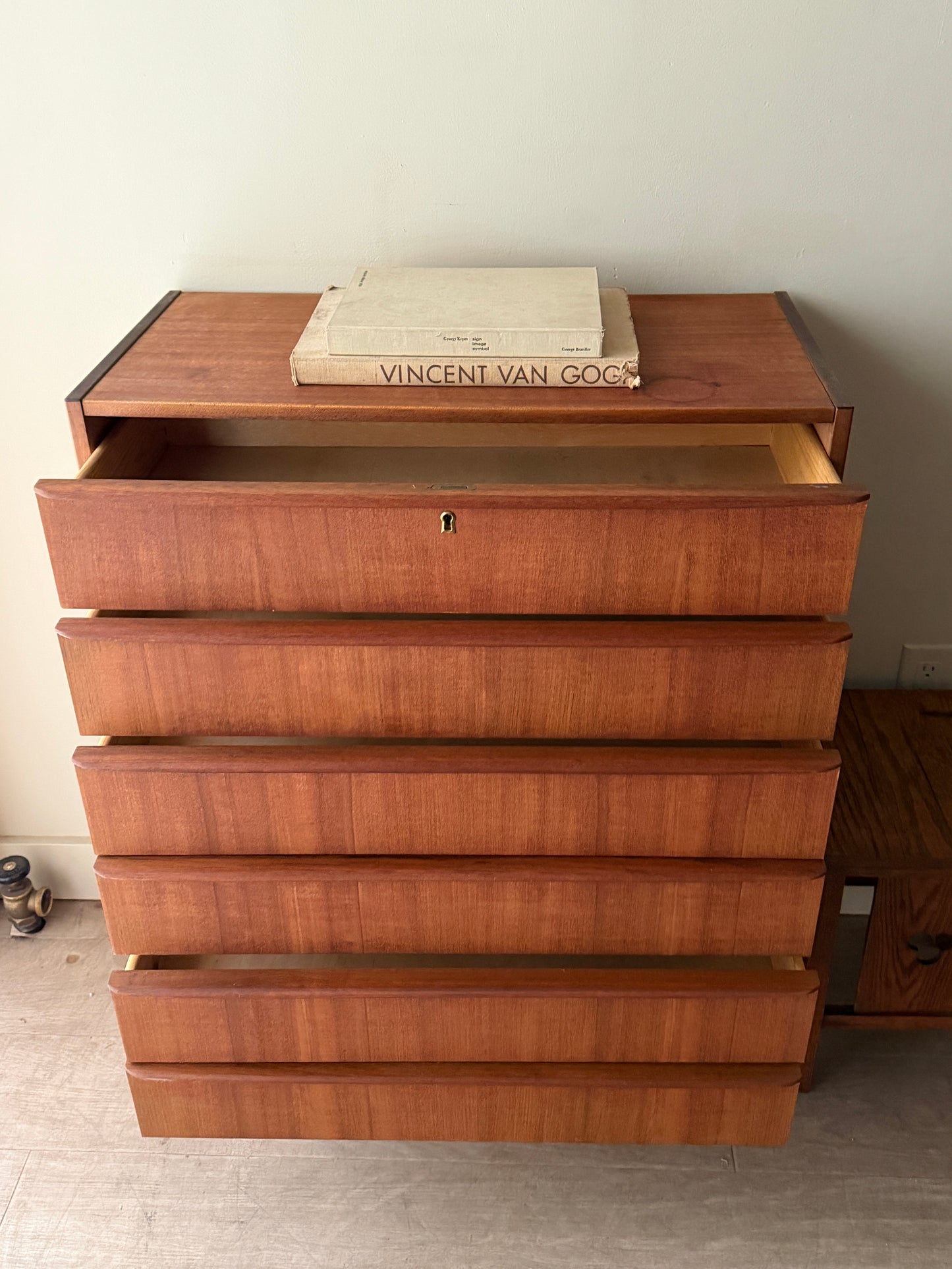 Danish teak tallboy dresser (right)