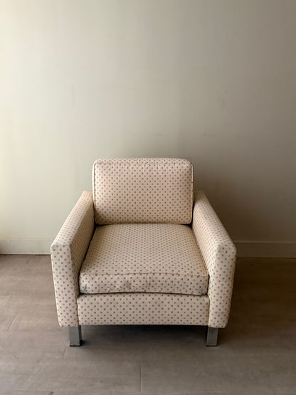 Upholstered chrome armchair