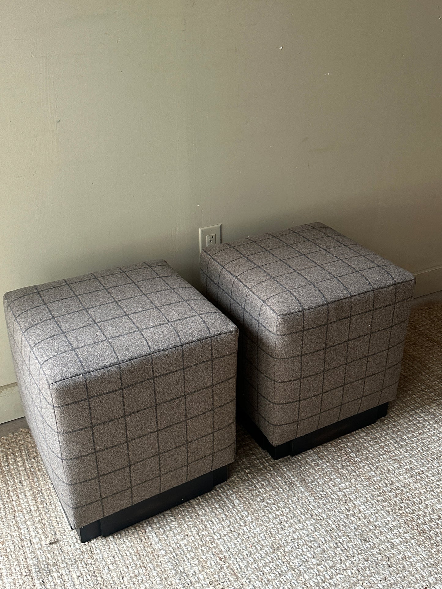 Wool ottomans. Holes in fabric on two sides.