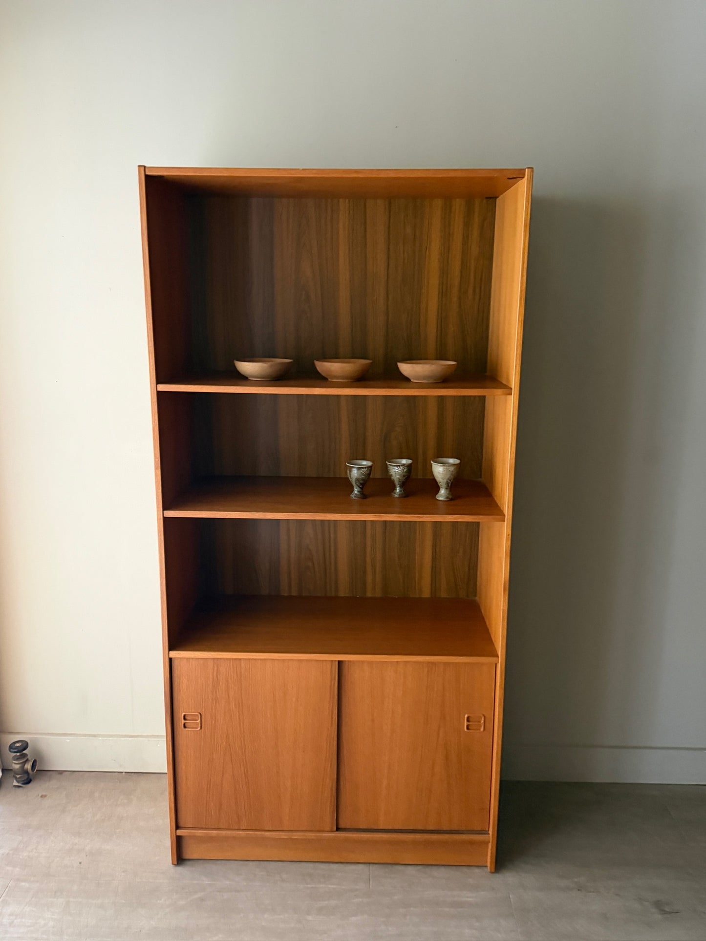 Danish teak bookcase with sliding doors