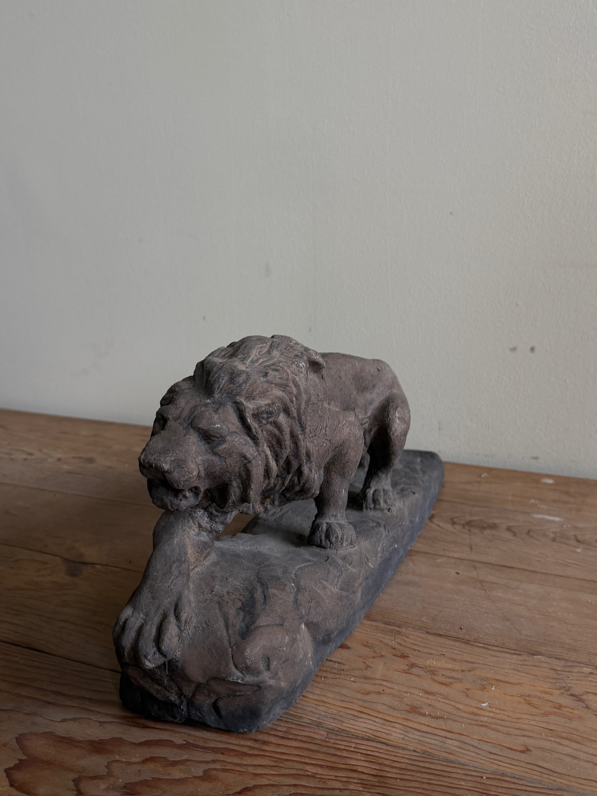 Cast-concrete lion sculpture