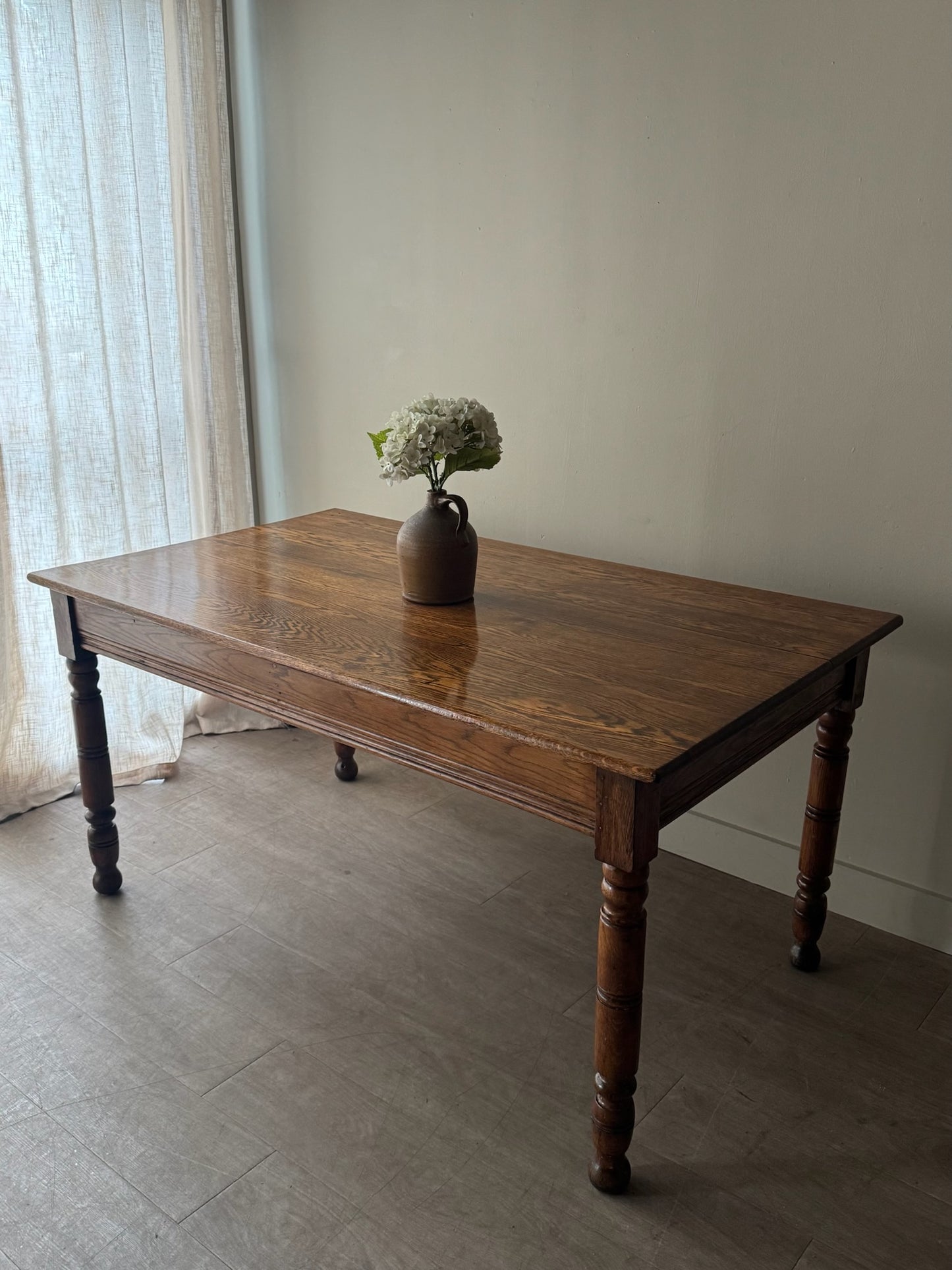 Golden oak dining table