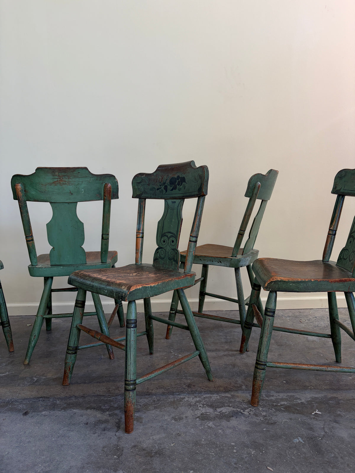 Pennsylvania Sheraton Paint-Decorated Plank Seat Chairs. Sold in pairs.