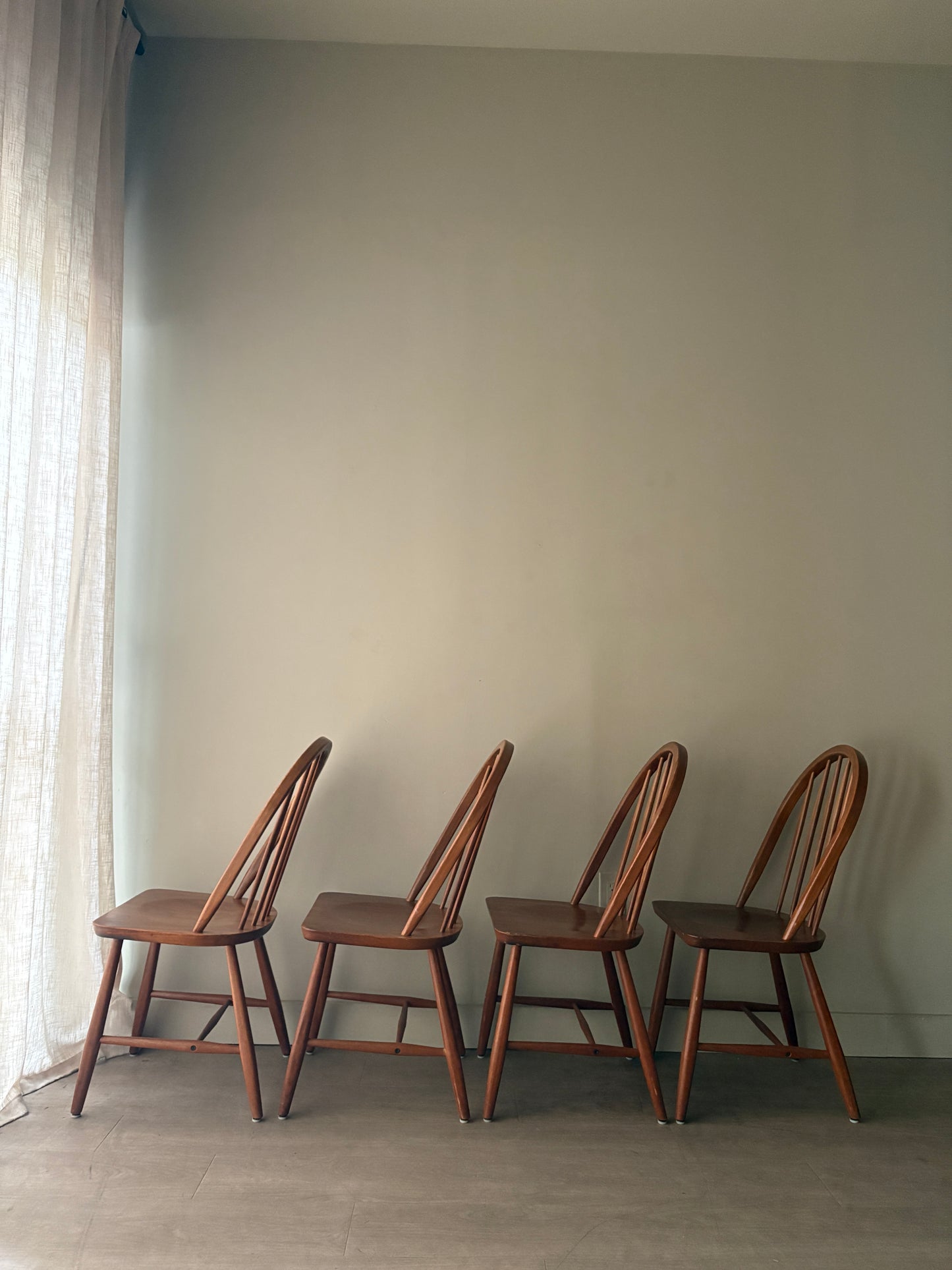 Danish teak hoop-back Windsor dining chairs. Sold in pairs.