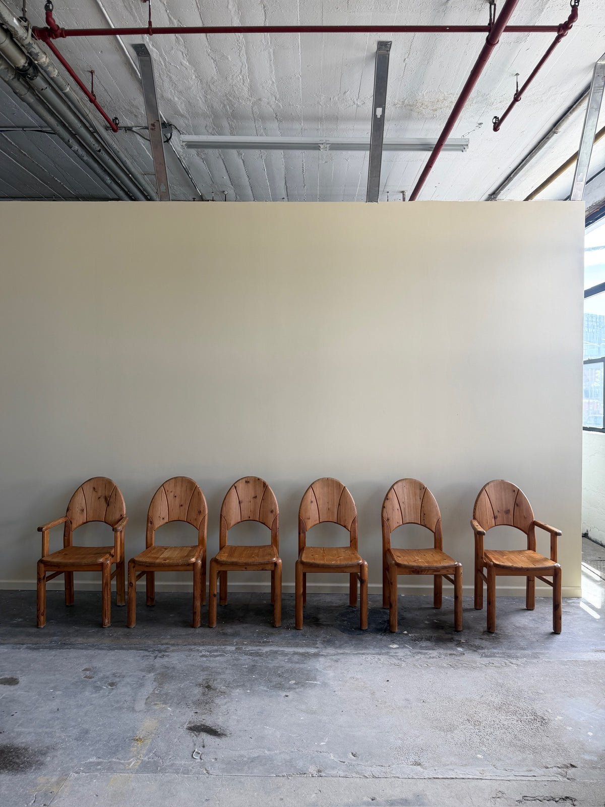 Danish pine dining chairs. Sold in pairs.