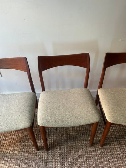 Teak dining chairs. Sold as a set of 4.