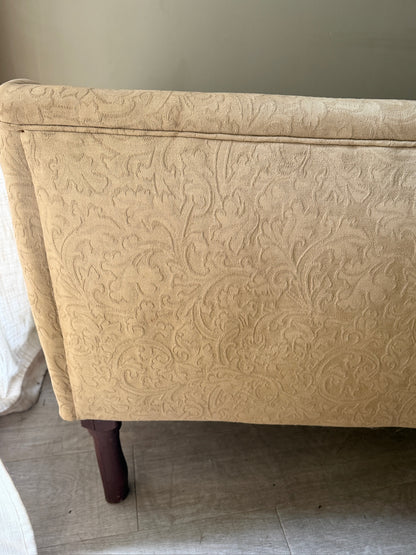 Damask upholstered settee with turned walnut legs