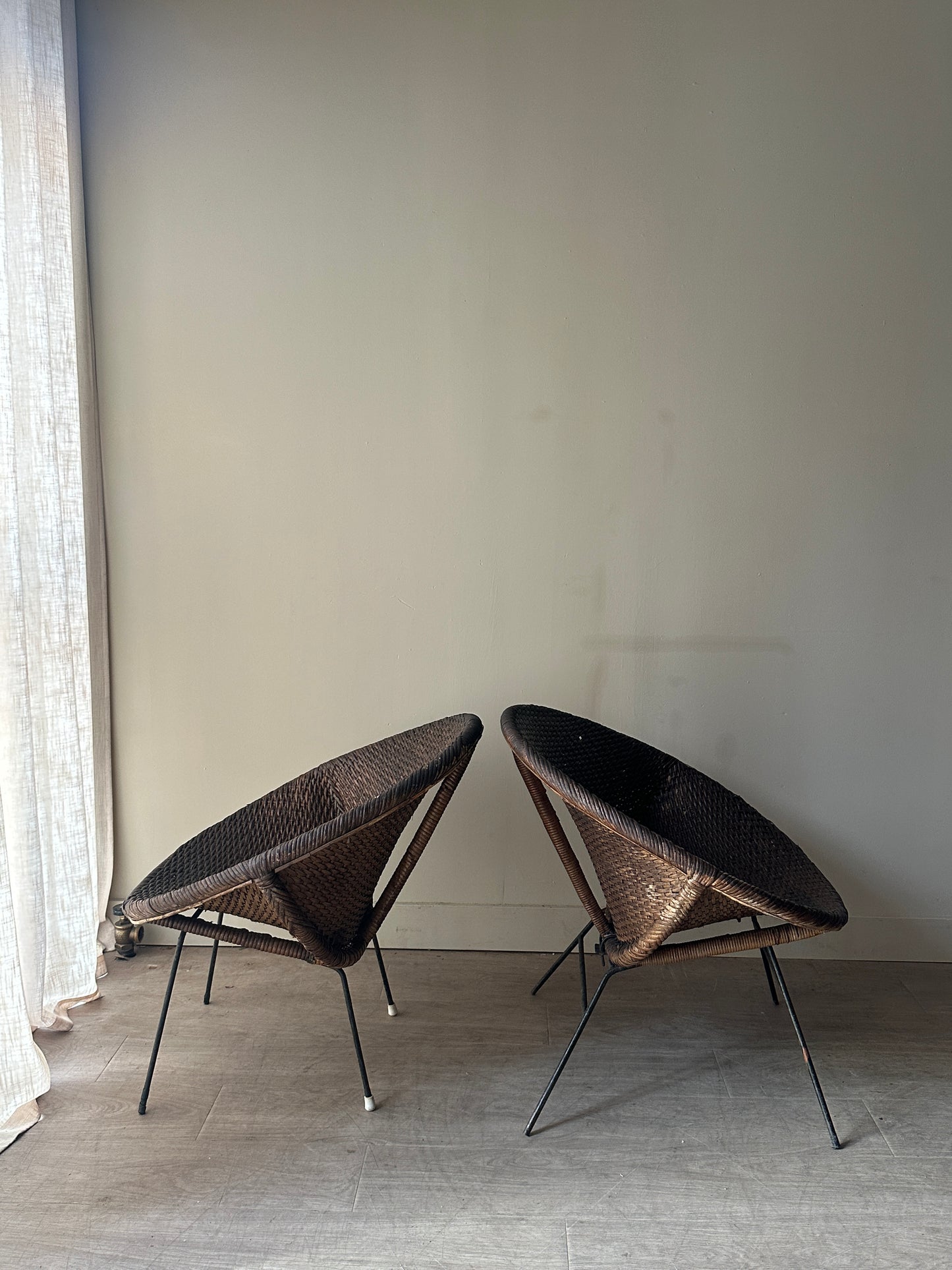 Woven rattan hoop chairs. Sold individually.