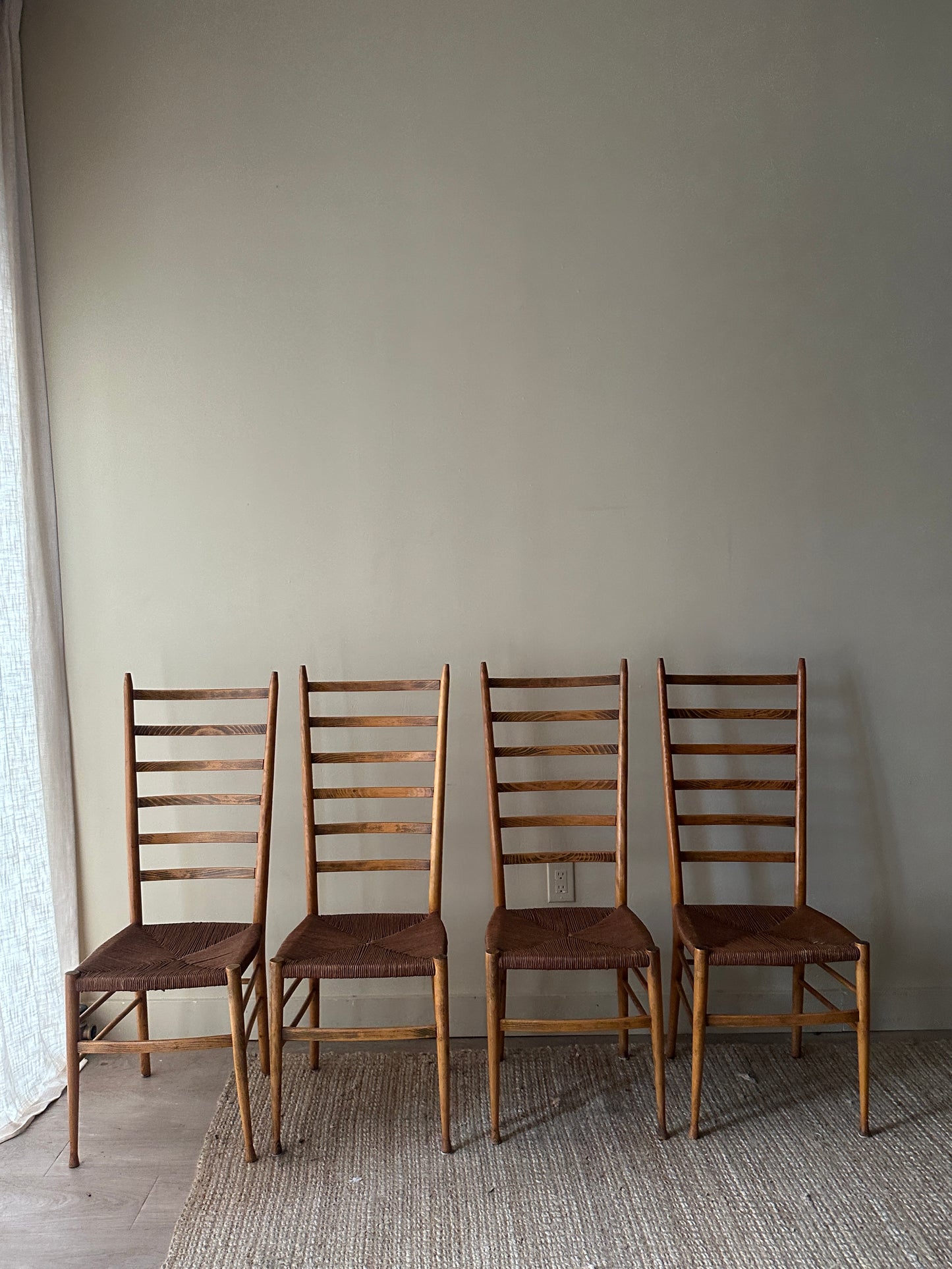 Woven ladder back chairs. Sets of 2.