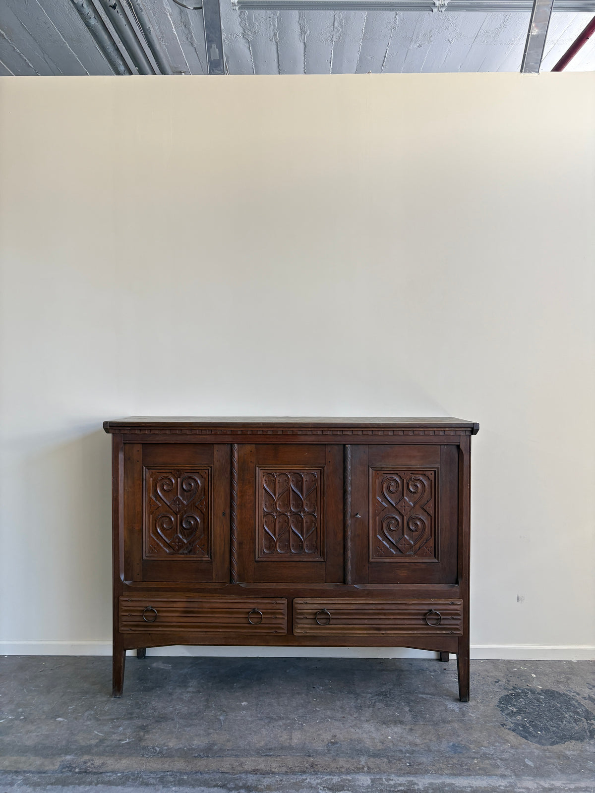 Carved oak sideboard