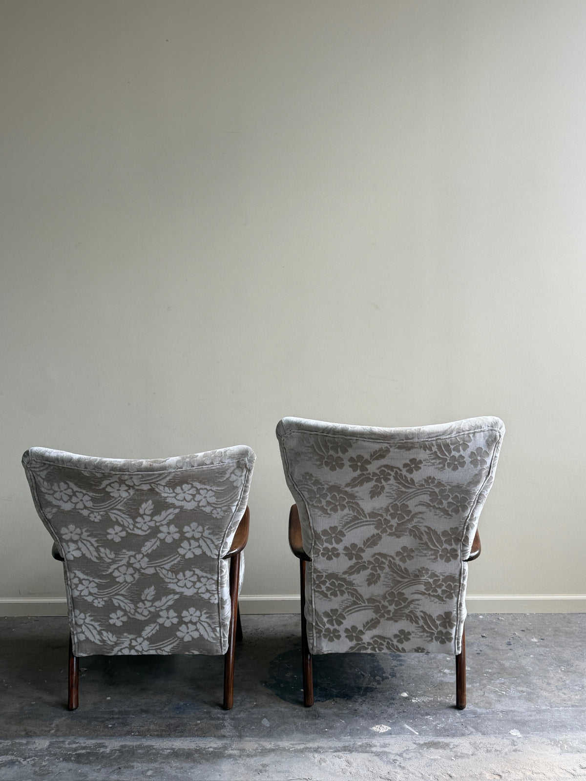 Danish wingback grey floral velvet lounge chairs (left)