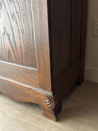 Golden oak cupboard with mirror