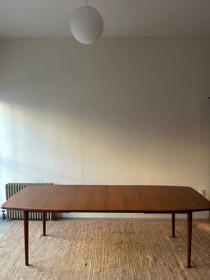 Danish teak dining table with two leaves