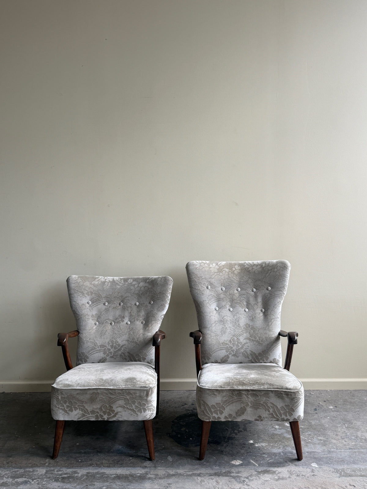 Danish wingback grey floral velvet lounge chairs (left)