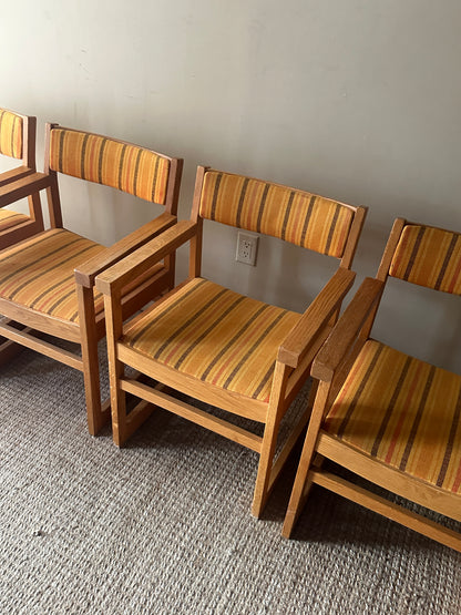 Oak armchairs. Sold individually.