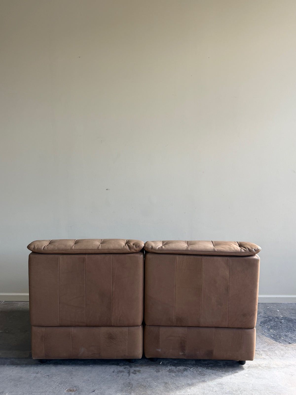 Swiss modular two-seat brown leather sofa